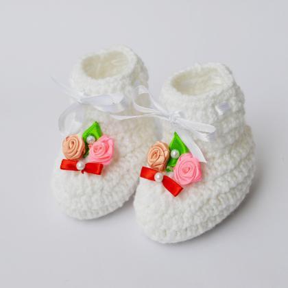 Combo of white and red baby booties